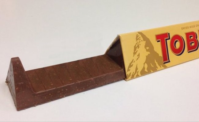 American chocolate manufacturer Mondelez reduces the weight of its widely popular Toblerone bars as a result of the Brexit vote, causing outrage on Twitter.
