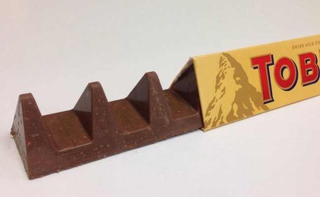 American chocolate manufacturer Mondelez reduces the weight of its widely popular Toblerone bars as a result of the Brexit vote, causing outrage on Twitter.